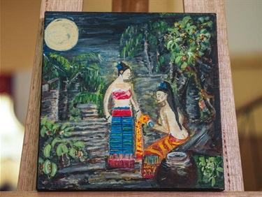 By Leisa Krause - a canvas painting portraying 2 women in Thai cultural attire amongst lush rainforest settings of palm trees and colourful flowers