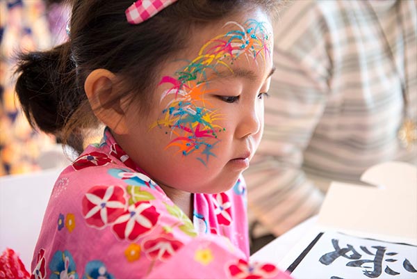 Japanese child wearing face paint