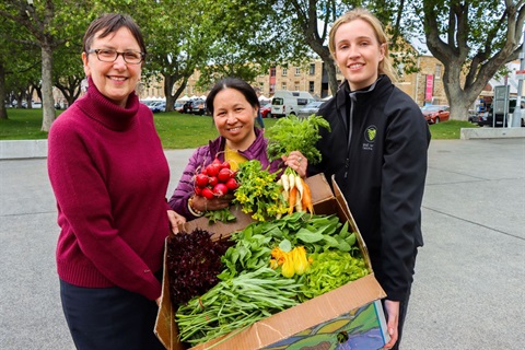 Helen Burnet, Dee Thao, Libby McKay preparing for the Salamanca Cookup on Saturday 20 November 2021