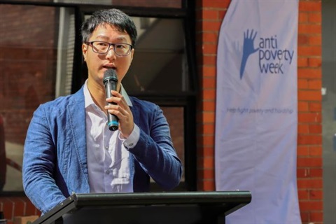 Wai Kit Yung speaking at Anti-Poverty Week