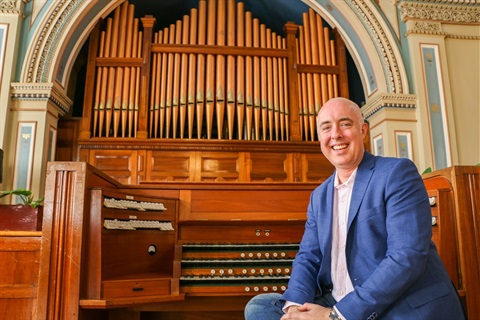Thomas Heywood with the Hobart Town Hall organ