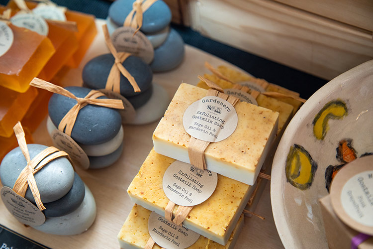 Exfoliating Goatmilk Soap in bars and in the shape of pebbles.