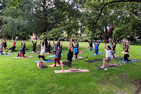 People doing yoga in St Davids Park