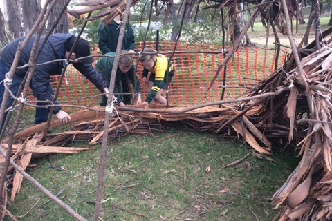 Mt Nelson Primary students building an bark shelter 2015