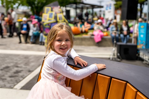 Young girl enjoys New Town street party.