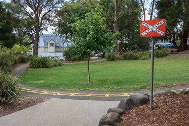 Grass area and 'train tracks' path