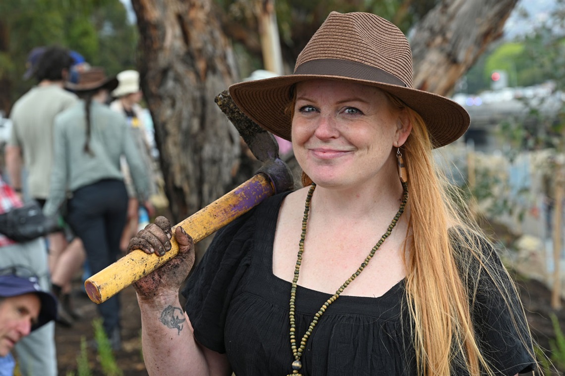 Bushcare volunteer on the New Town Rivulet.
