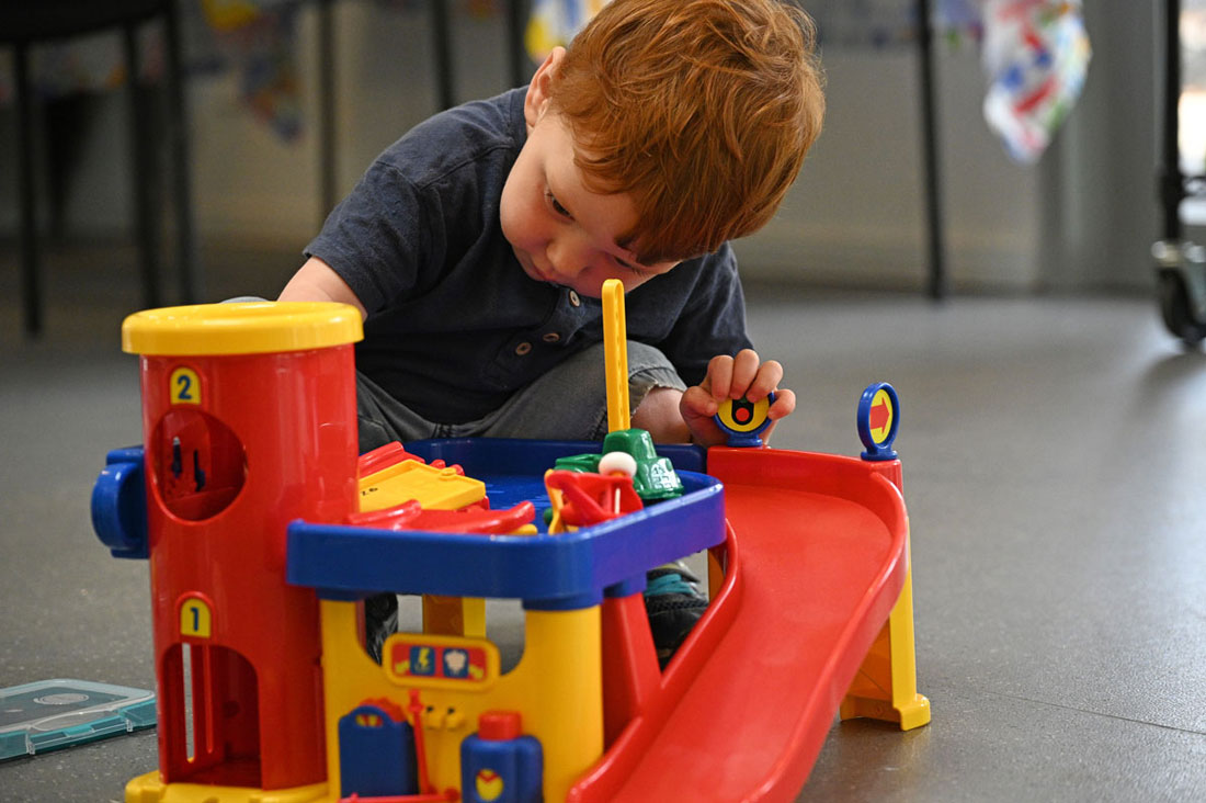 Child with play equipment