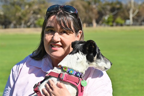 Tanzi Lewis holding her dog Abbey