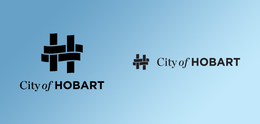 Mono versions of the logo on a blue background