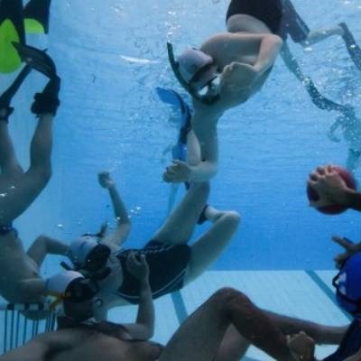 Underwater Rugby - player trying to score a try in underwater rugby